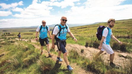 Two men hiking up one of the Yorkshire Three Peaks