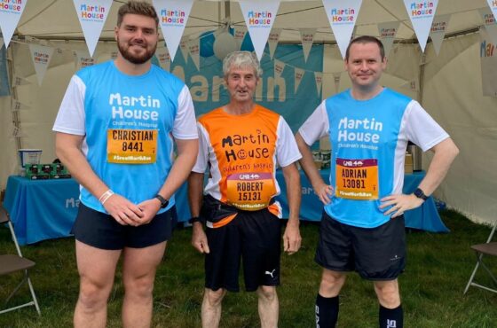 Three men in Martin House Running gear