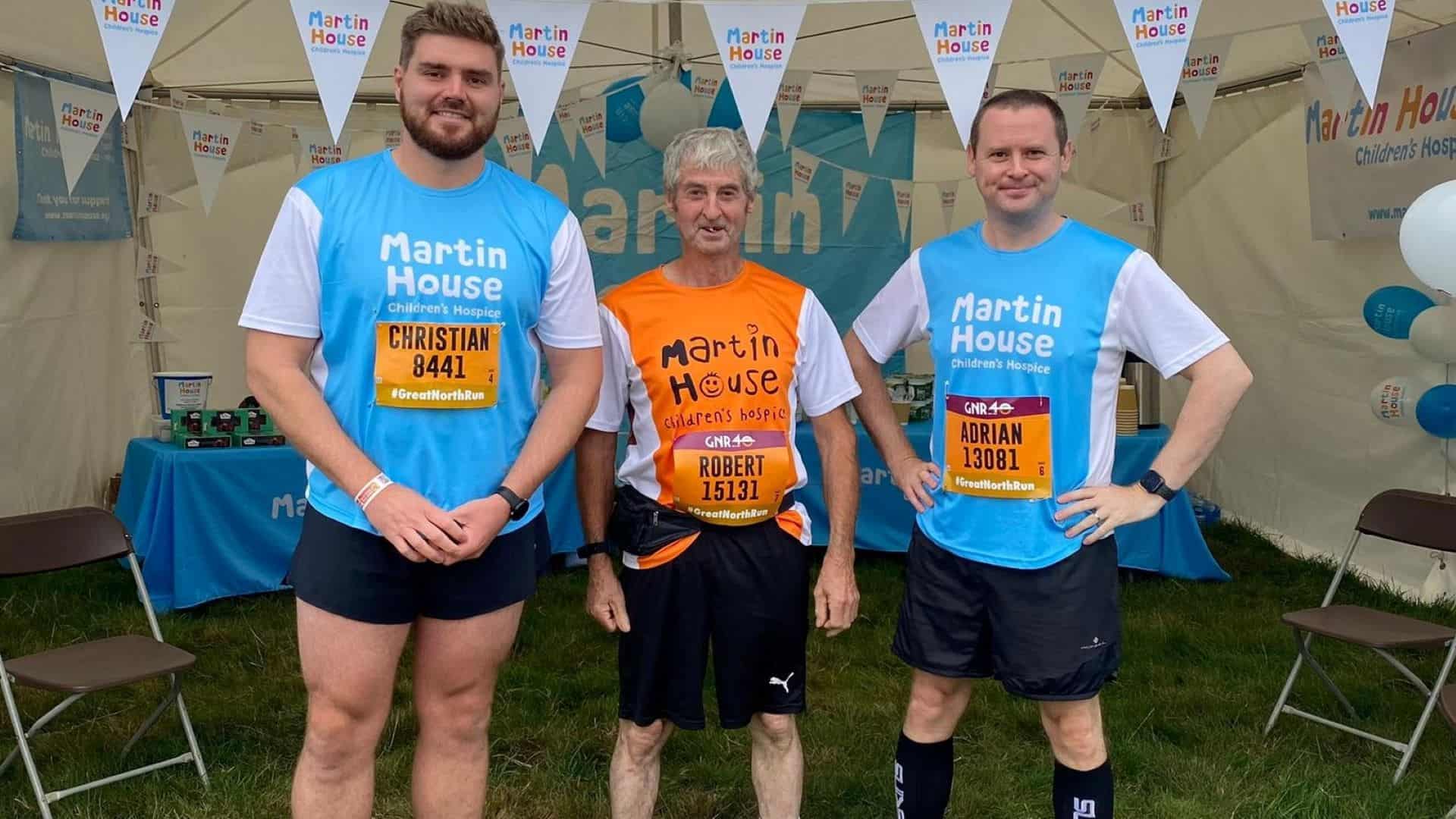 Three men in Martin House Running gear