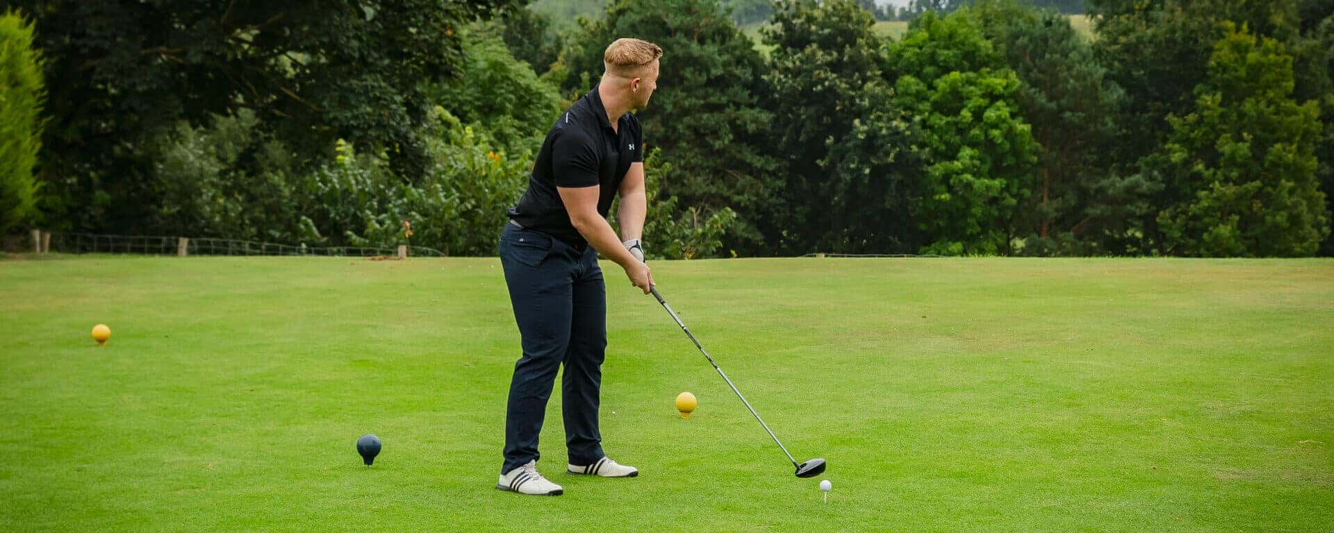 Man taking a golf swing