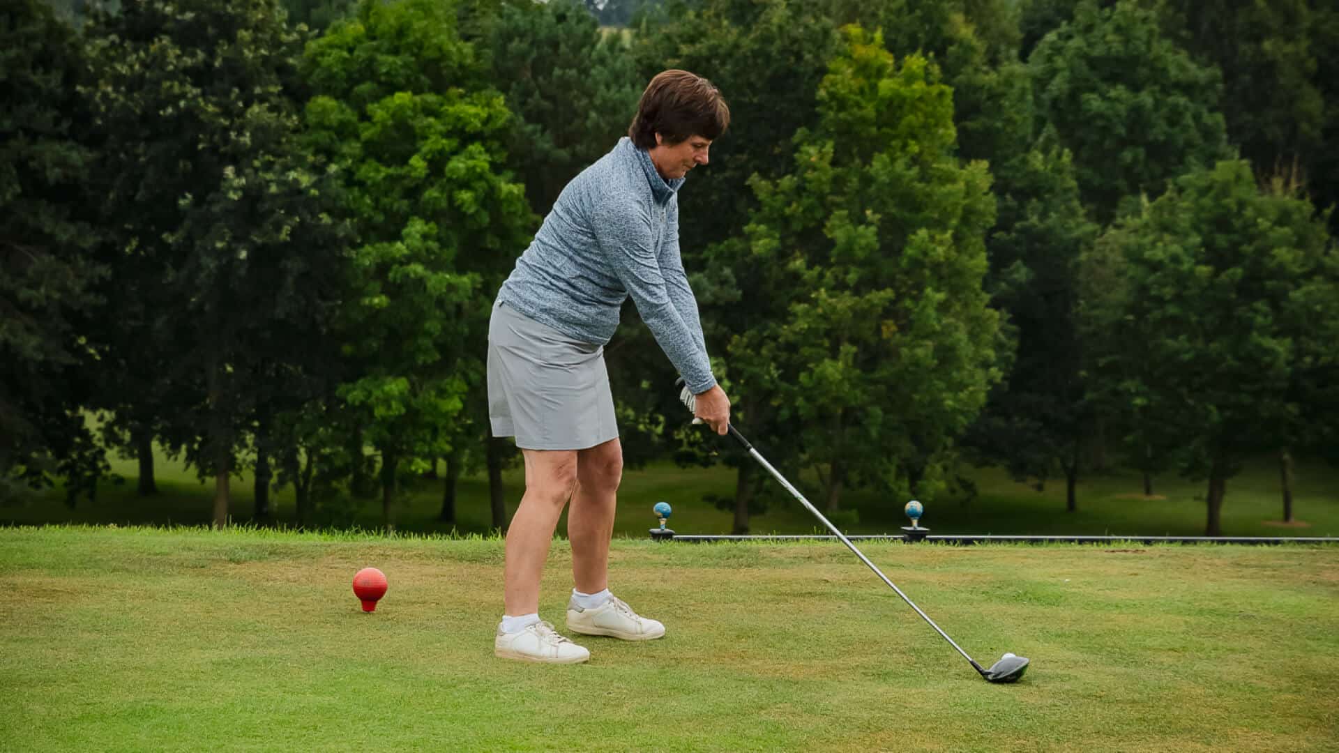 Woman doing a golf swing