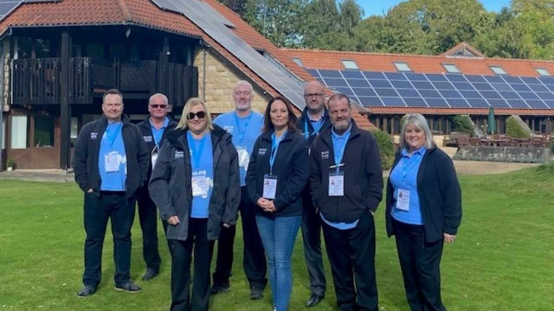 Group photo of lottery team outside Martin House