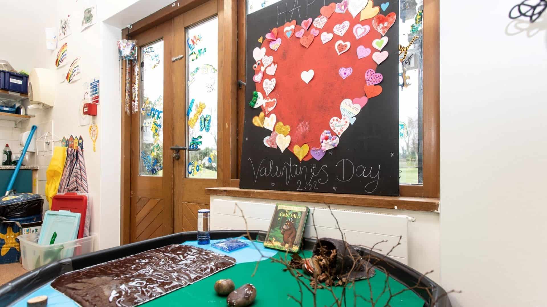 Arts and crafts room with heart on the wall