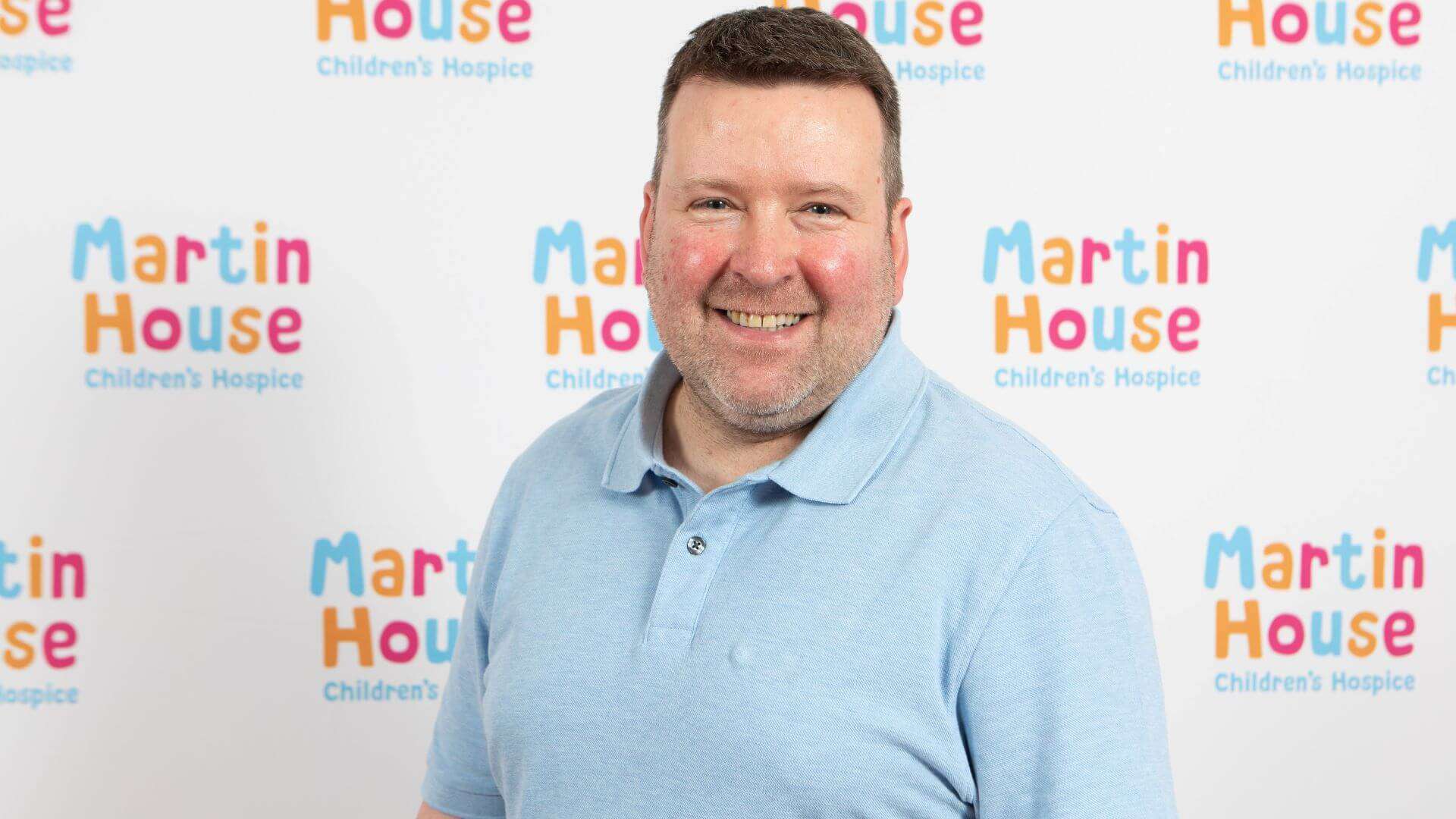 Head shot of Steve Lawman in front of Martin House back drop.