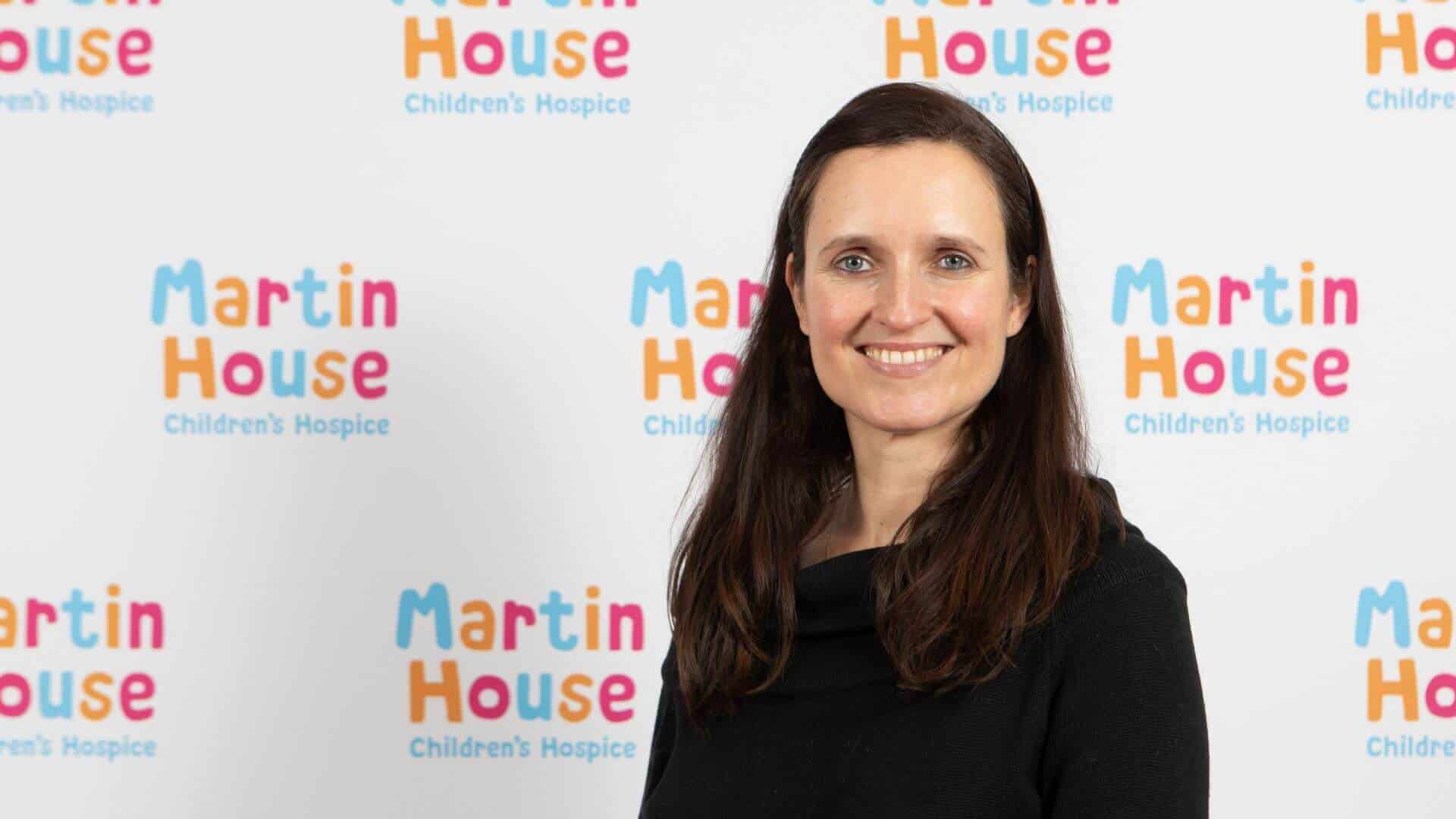 Head shot of Lindsey in front of Martin House back drop.