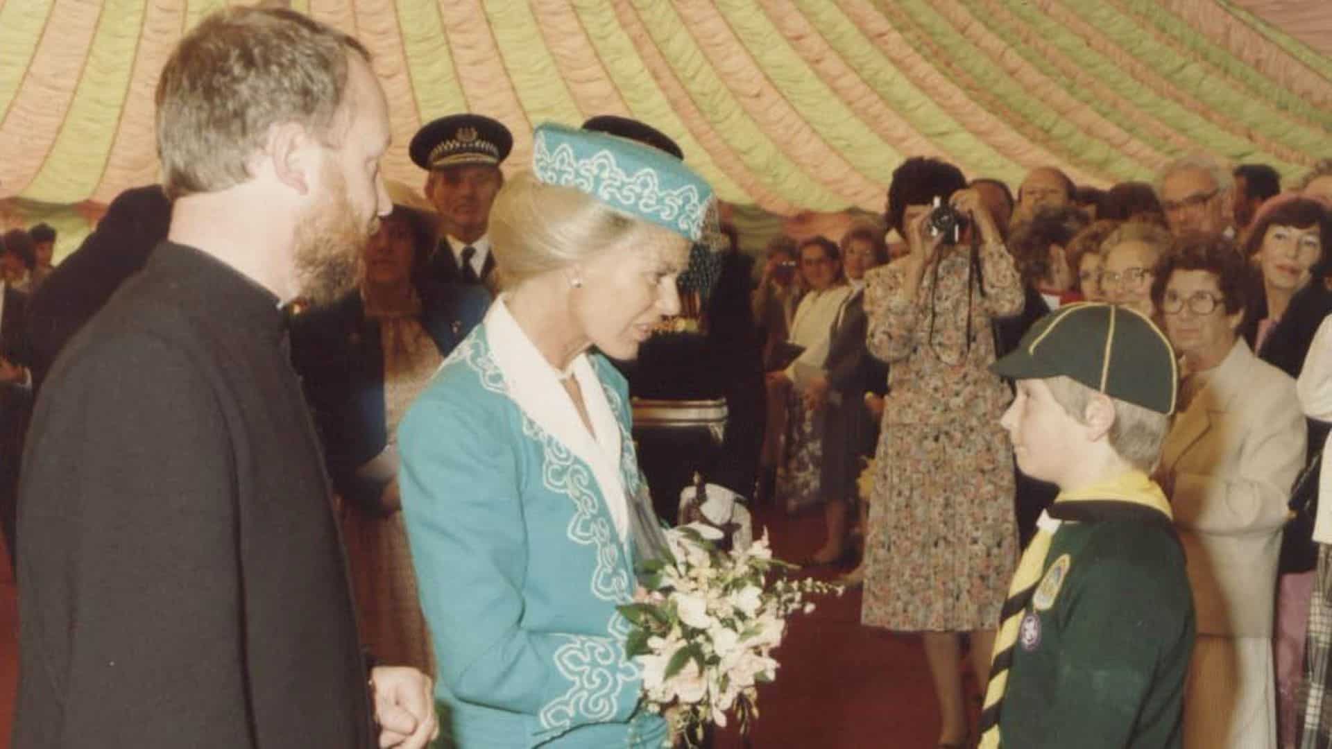 Duchess of Kent talking to young boy scout.