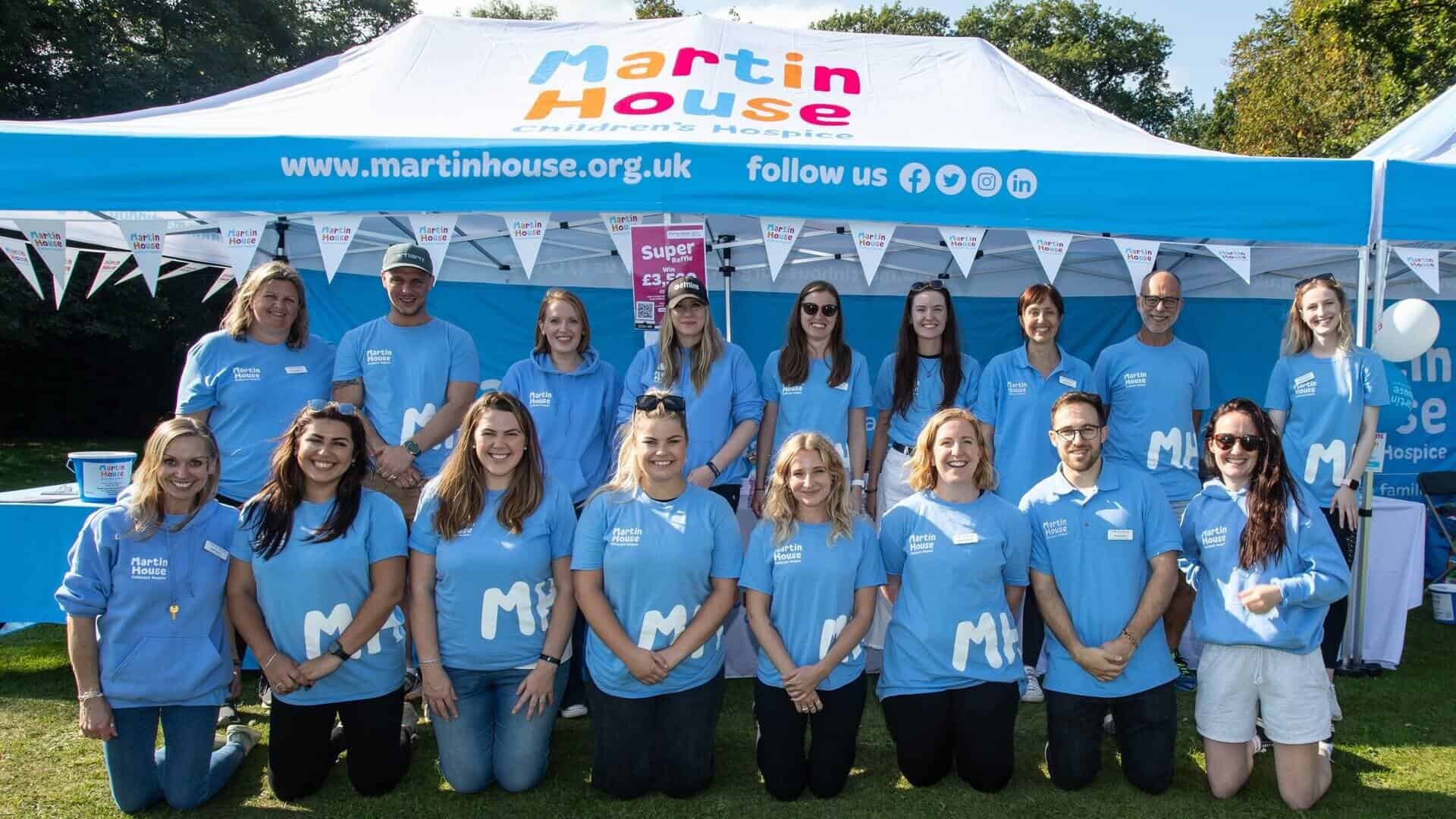 Large group of people under Martin House gazebo