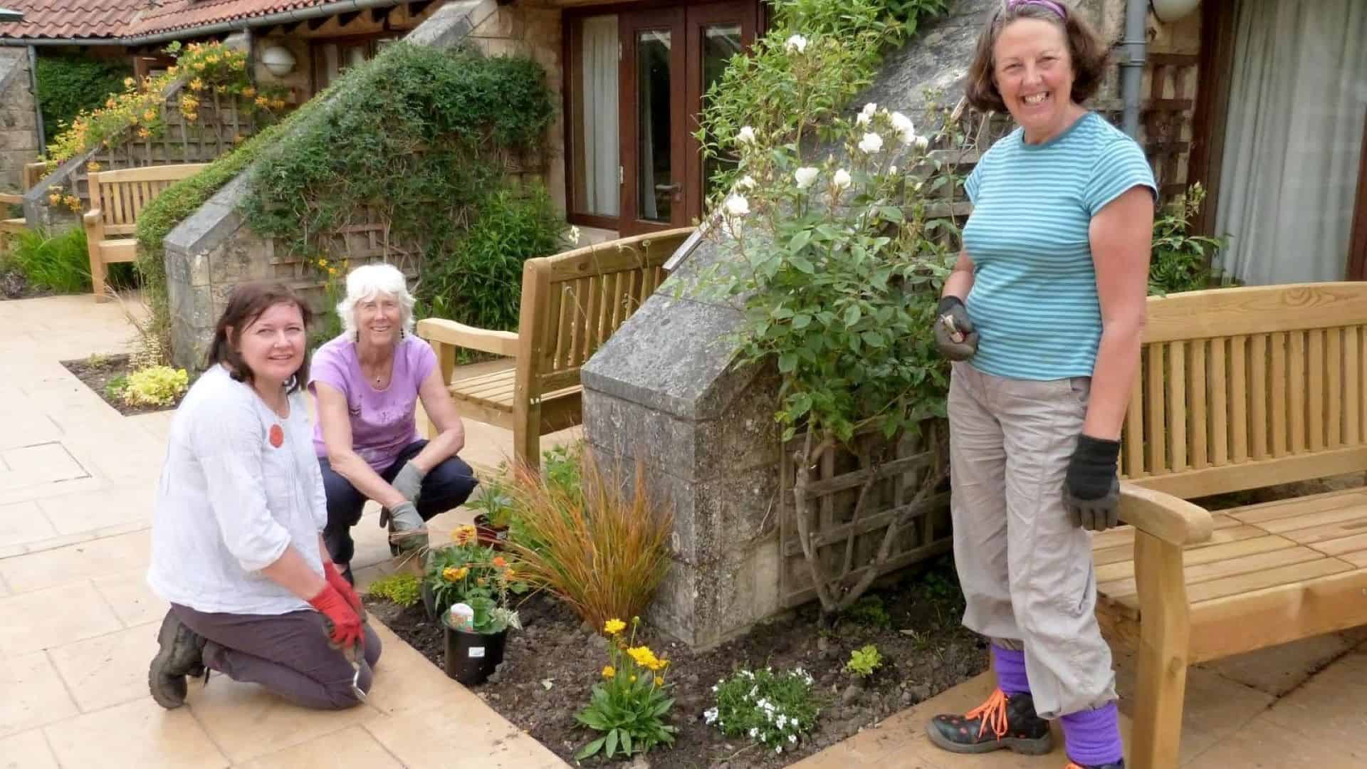 Gardening volunteers working in hospice