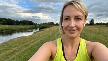 Laura Bell in countryside on run.