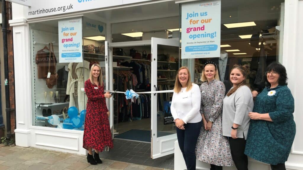 Beverley shop staff stood in front of shop.