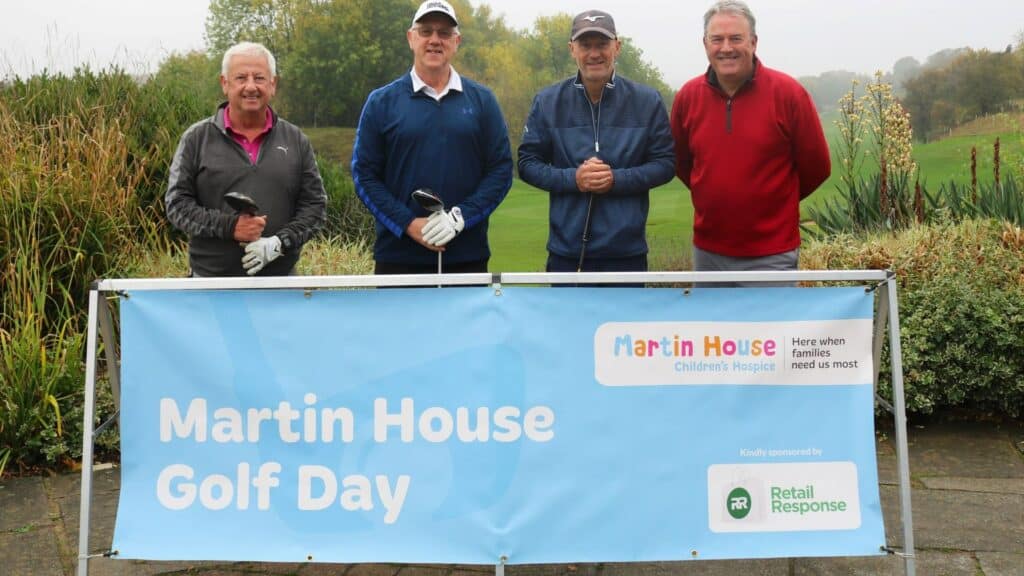 TV presenter and Martin House ambassador Duncan Wood (right) with the Retail Response team at the golf day.