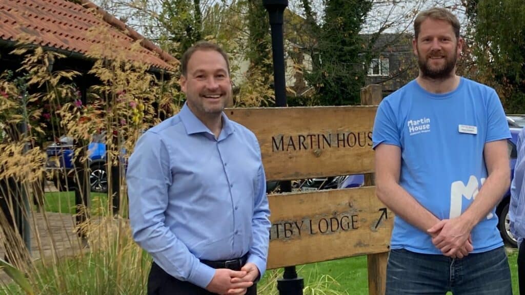 Matt smiling with our regional fundraiser while visiting Martin House.