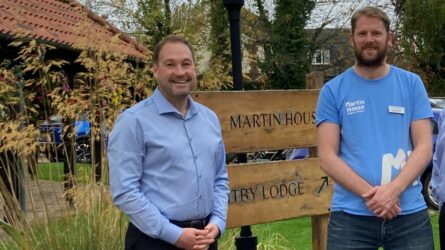 Matt smiling with our regional fundraiser while visiting Martin House.