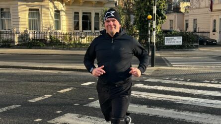 Peter smiling while running.